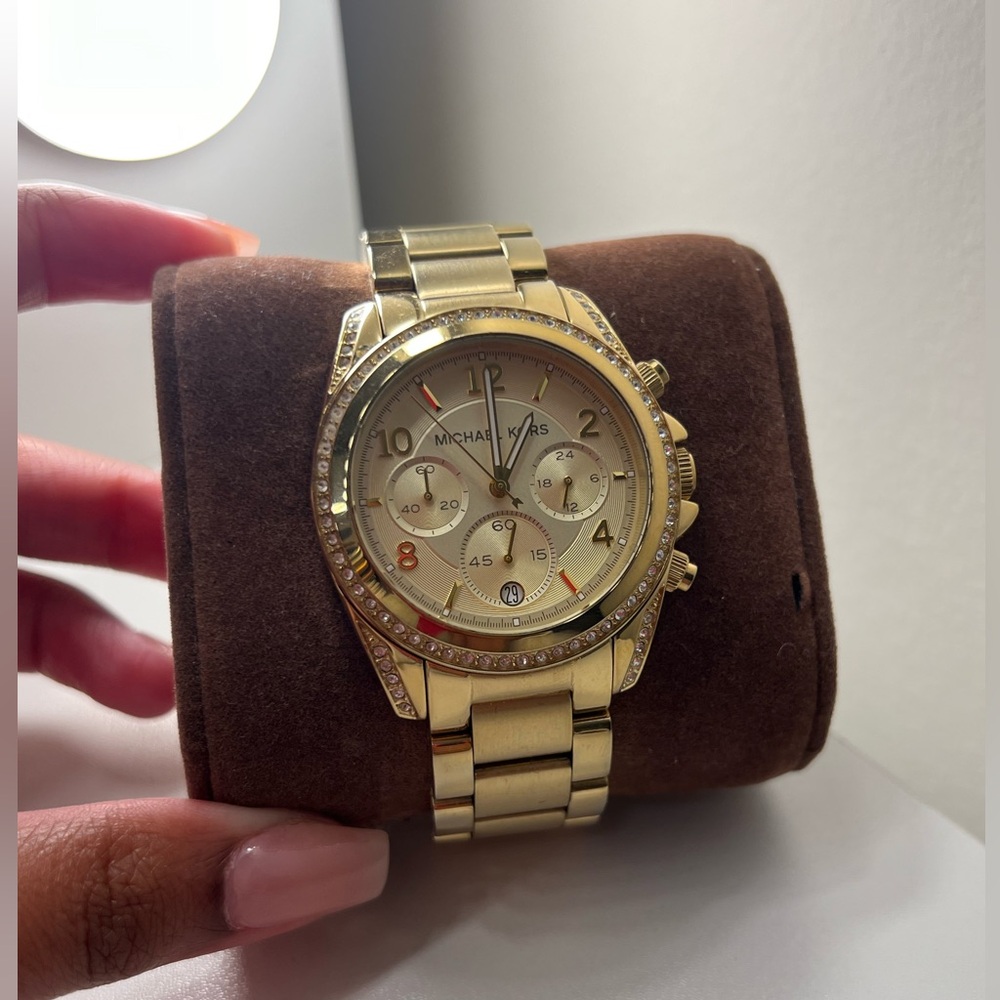 Michael Kors women’s gold face watch